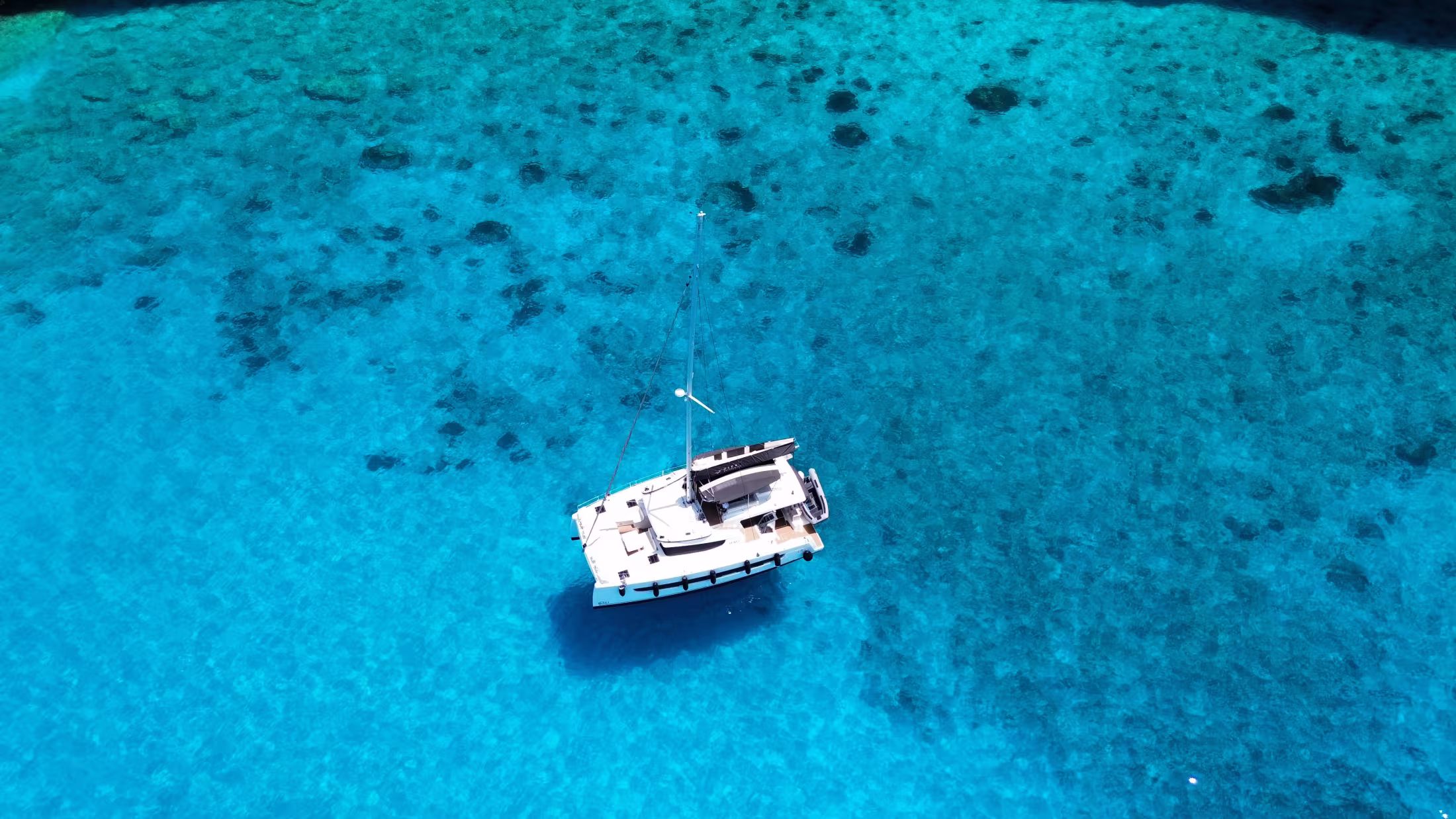 Olea Catamaran on green Ionian Sea